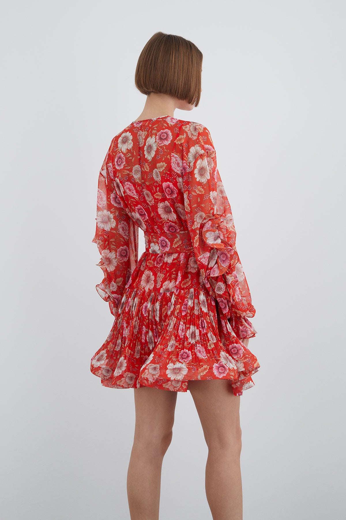 Kolda Volan Detaylı Eteği Pileli Mini Desenli Elbise