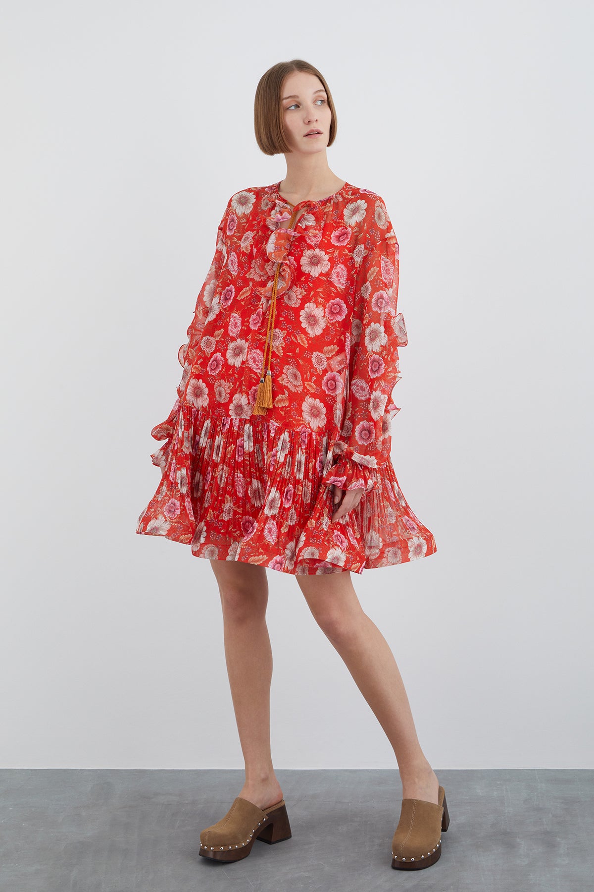 Kolda Volan Detaylı Eteği Pileli Mini Desenli Elbise