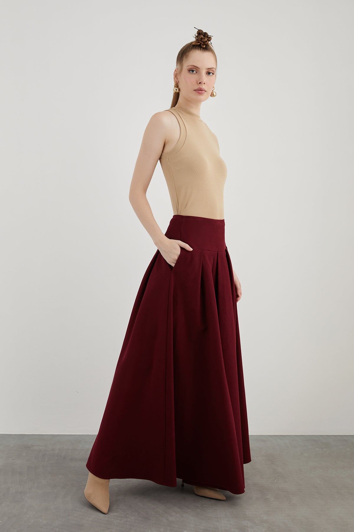 Yüksek Bel Bol Kesim Pileli Yan Cepli Uzun Kloş Etek