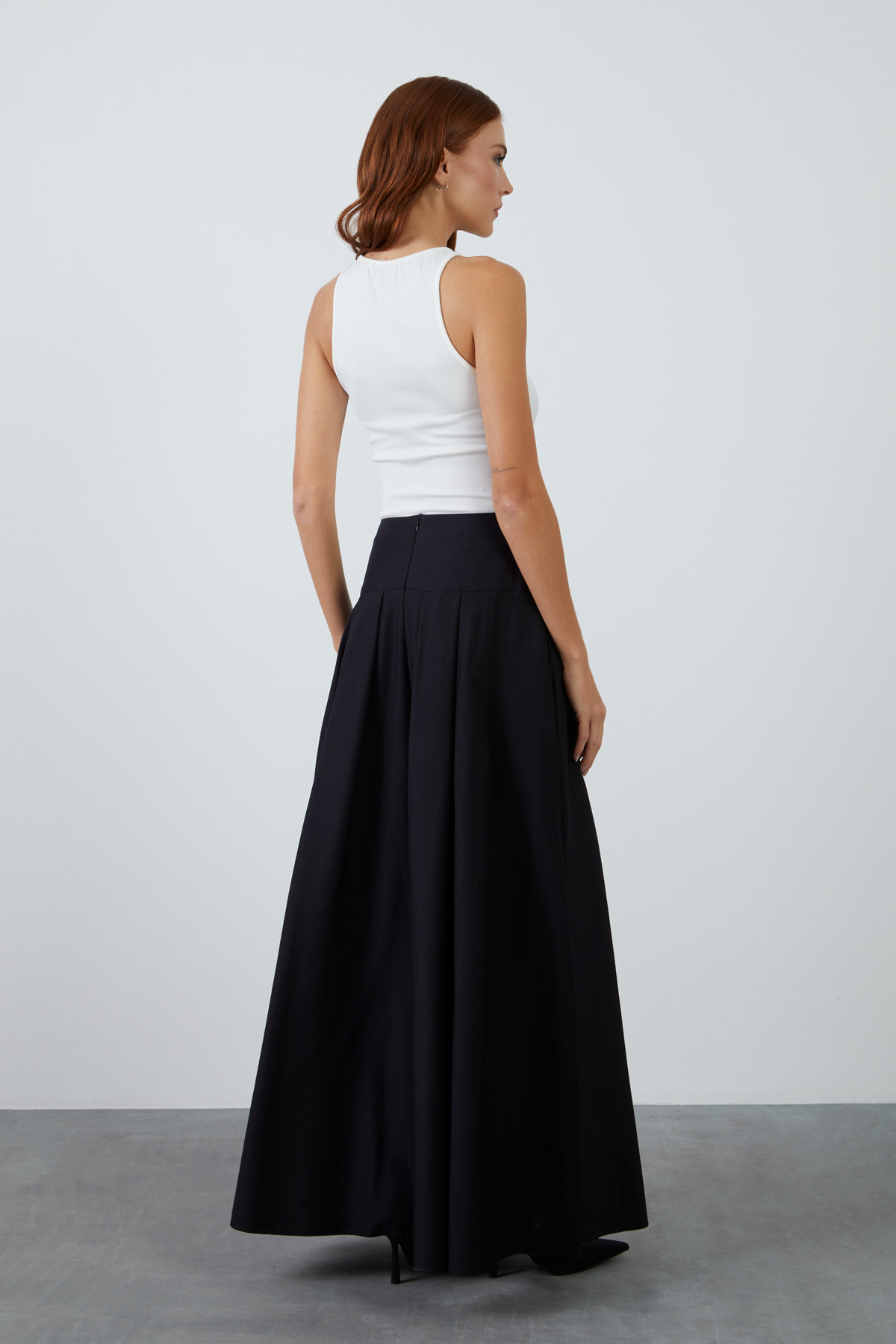 Yüksek Bel Bol Kesim Pileli Yan Cepli Uzun Kloş Etek