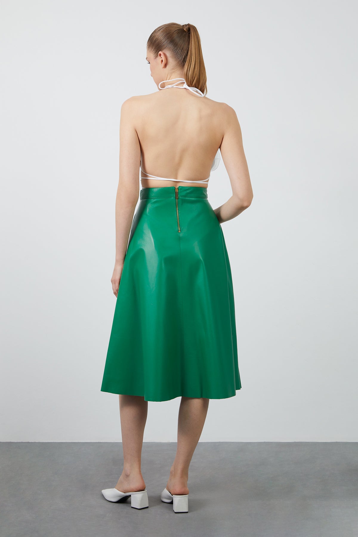 Sol Tarafı Piliseli Deri Etek