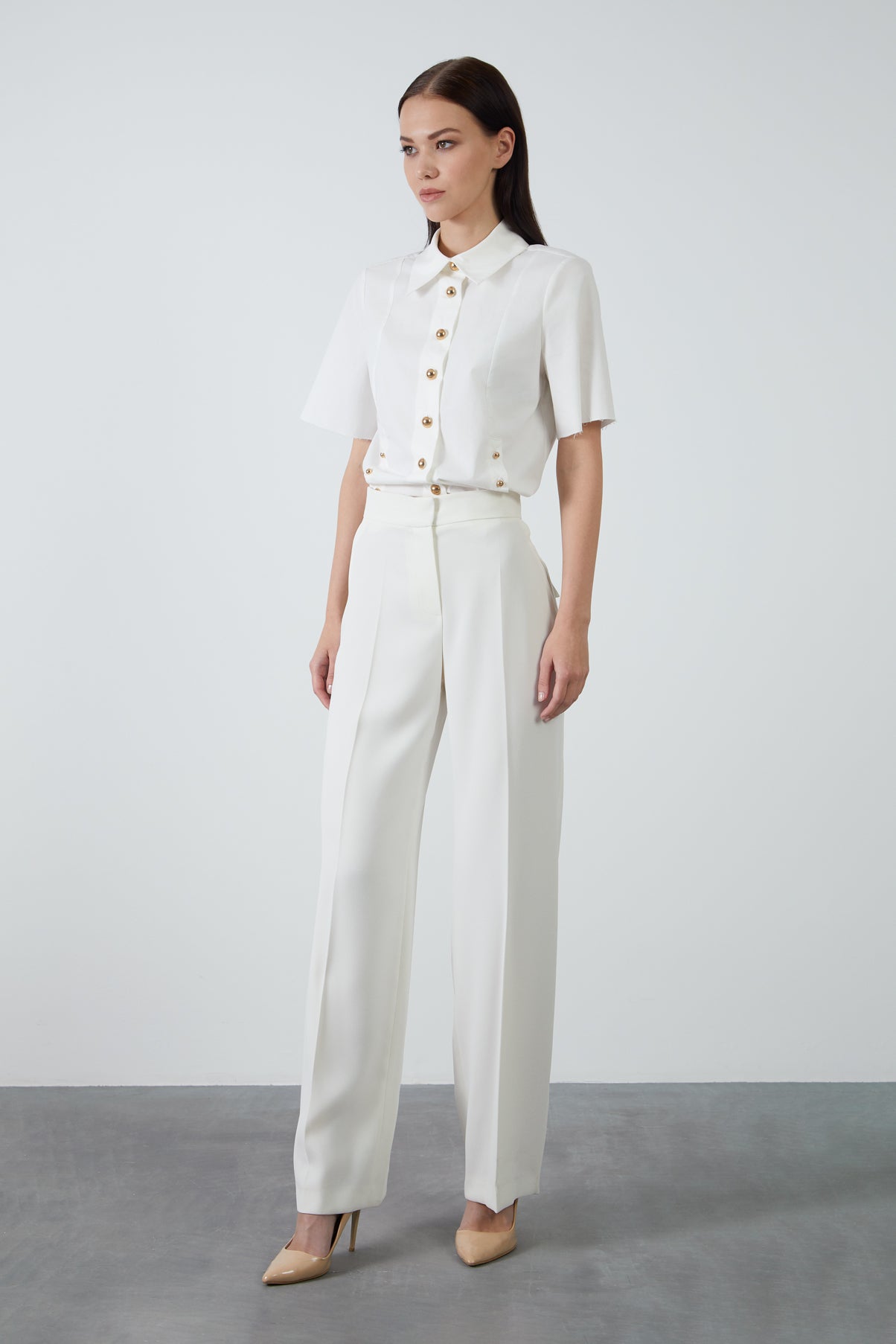 Arkadan Kapak Cepli Bol Pantolon