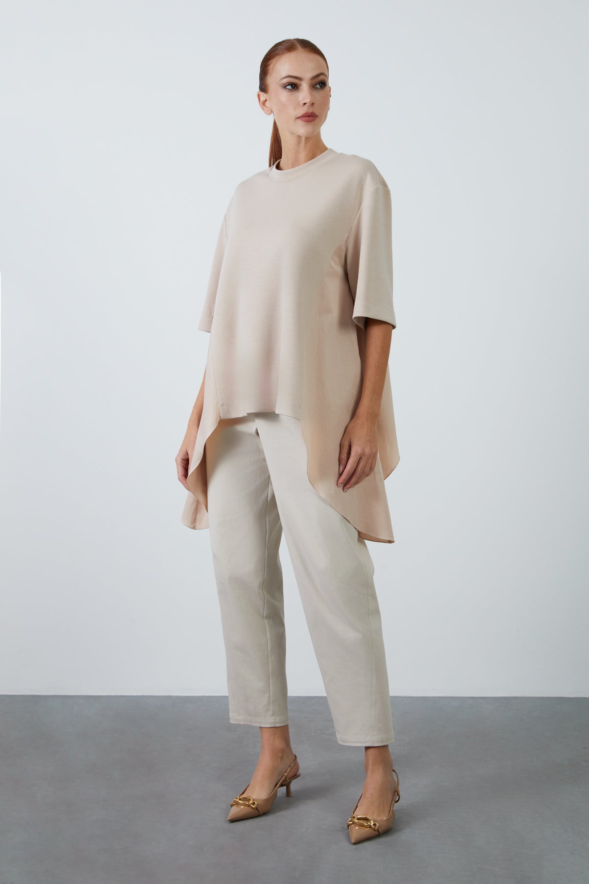 Etek Ucu Asimetrik Yarım Kollu Örme T-Shirt