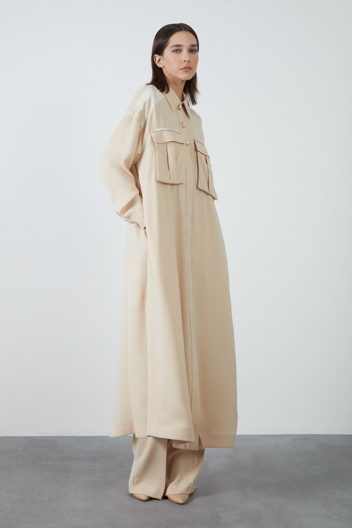 Arkası Bağlanabilir Yırtmaçlı Önü Cepli Uzun Bluz