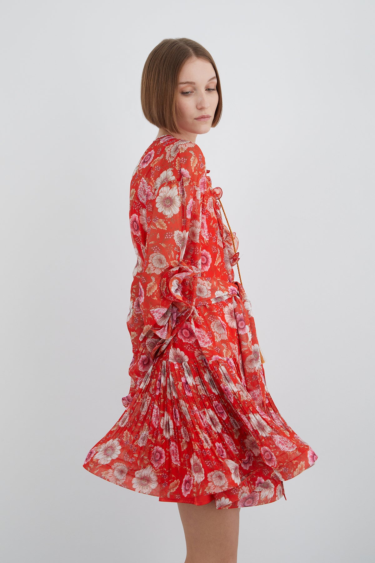 Kolda Volan Detaylı Eteği Pileli Mini Desenli Elbise