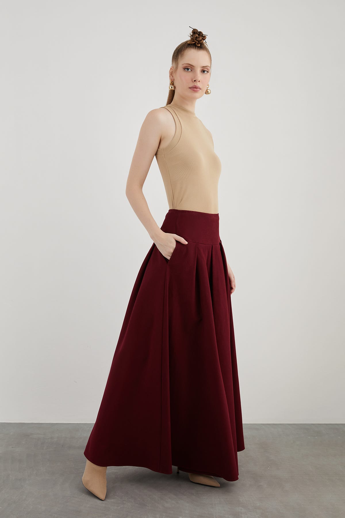 Yüksek Bel Bol Kesim Pileli Yan Cepli Uzun Kloş Etek