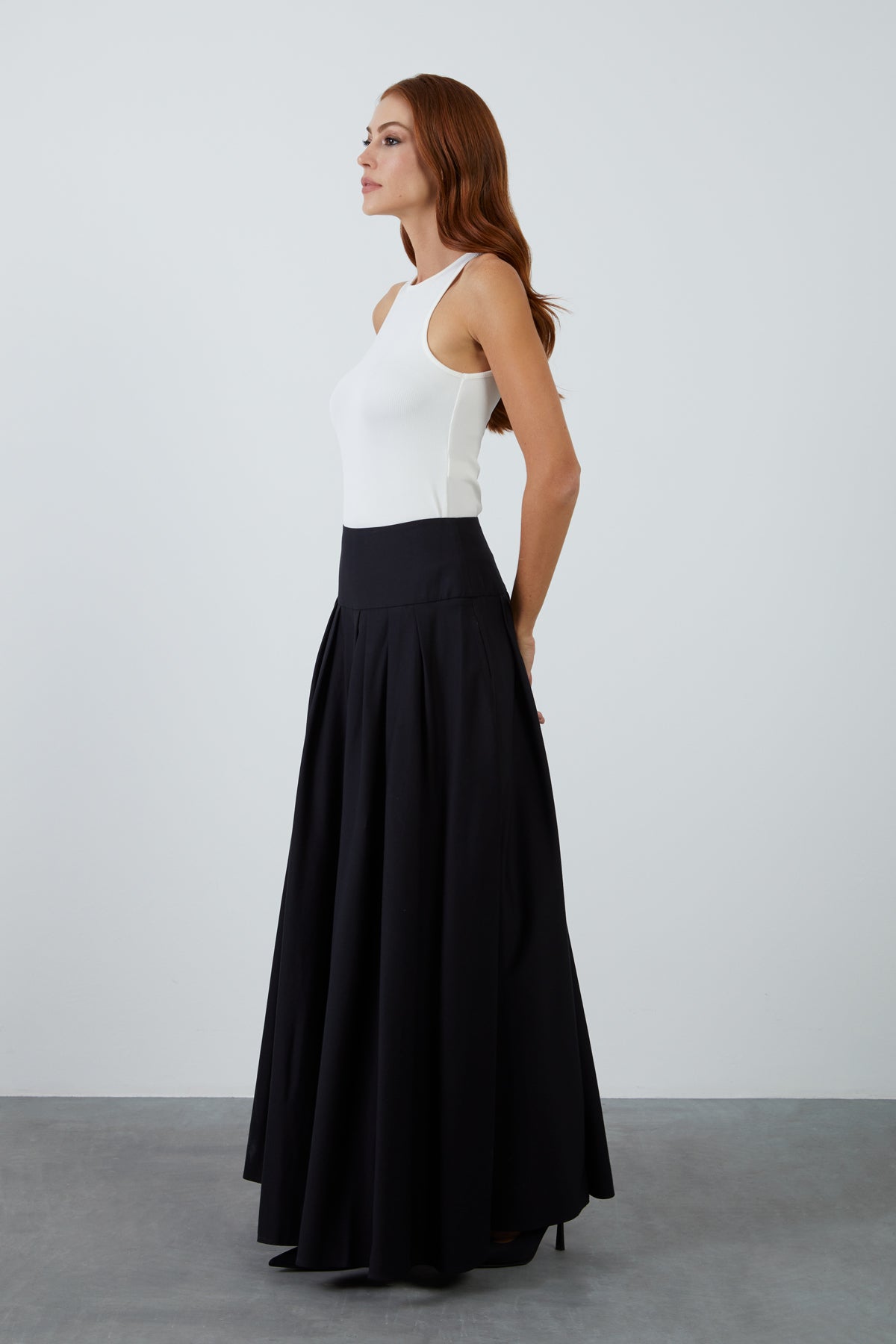 Yüksek Bel Bol Kesim Pileli Yan Cepli Uzun Kloş Etek