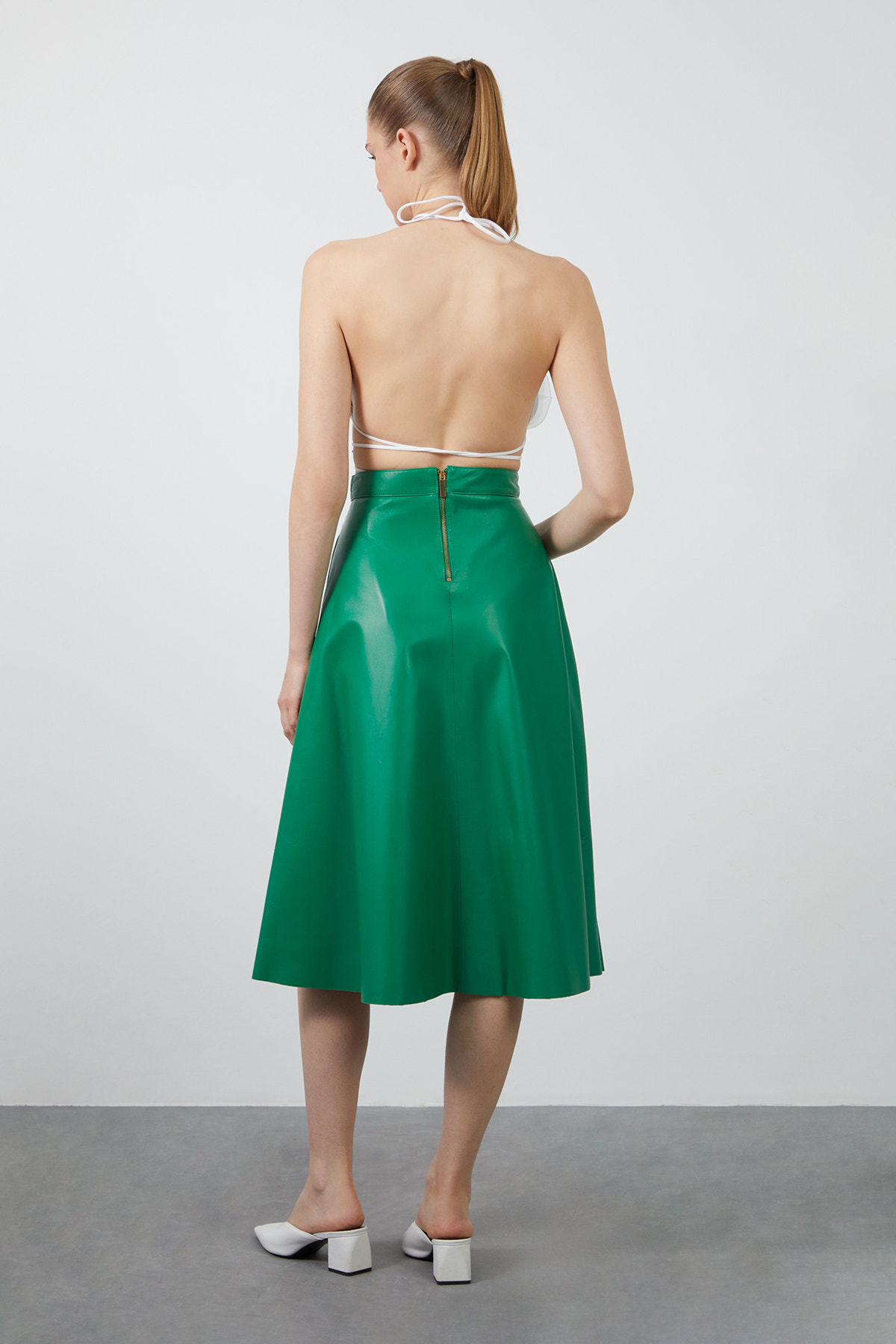 Sol Tarafı Piliseli Deri Etek