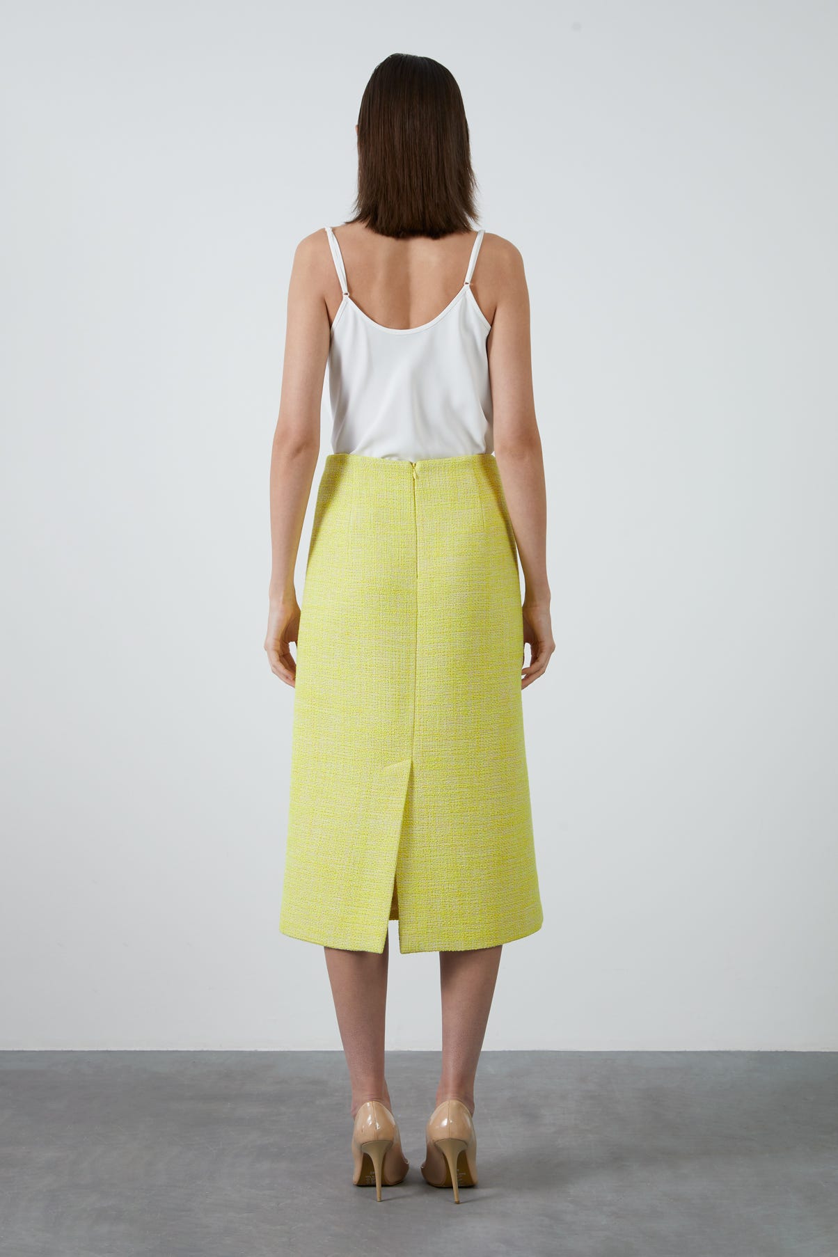 Arkası Yırtmaçlı Midi Tüvit Kumaş Etek