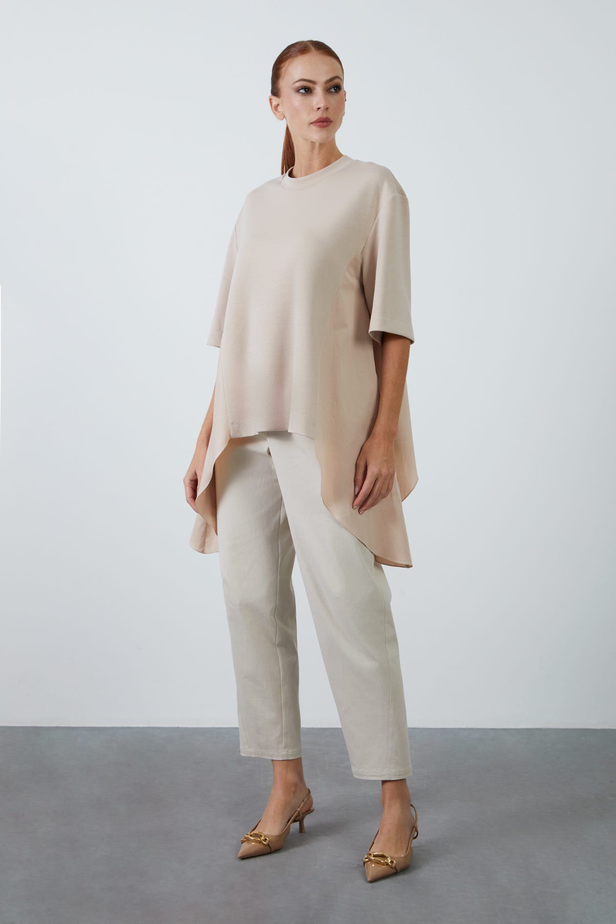 Etek Ucu Asimetrik Yarım Kollu Örme T-Shirt