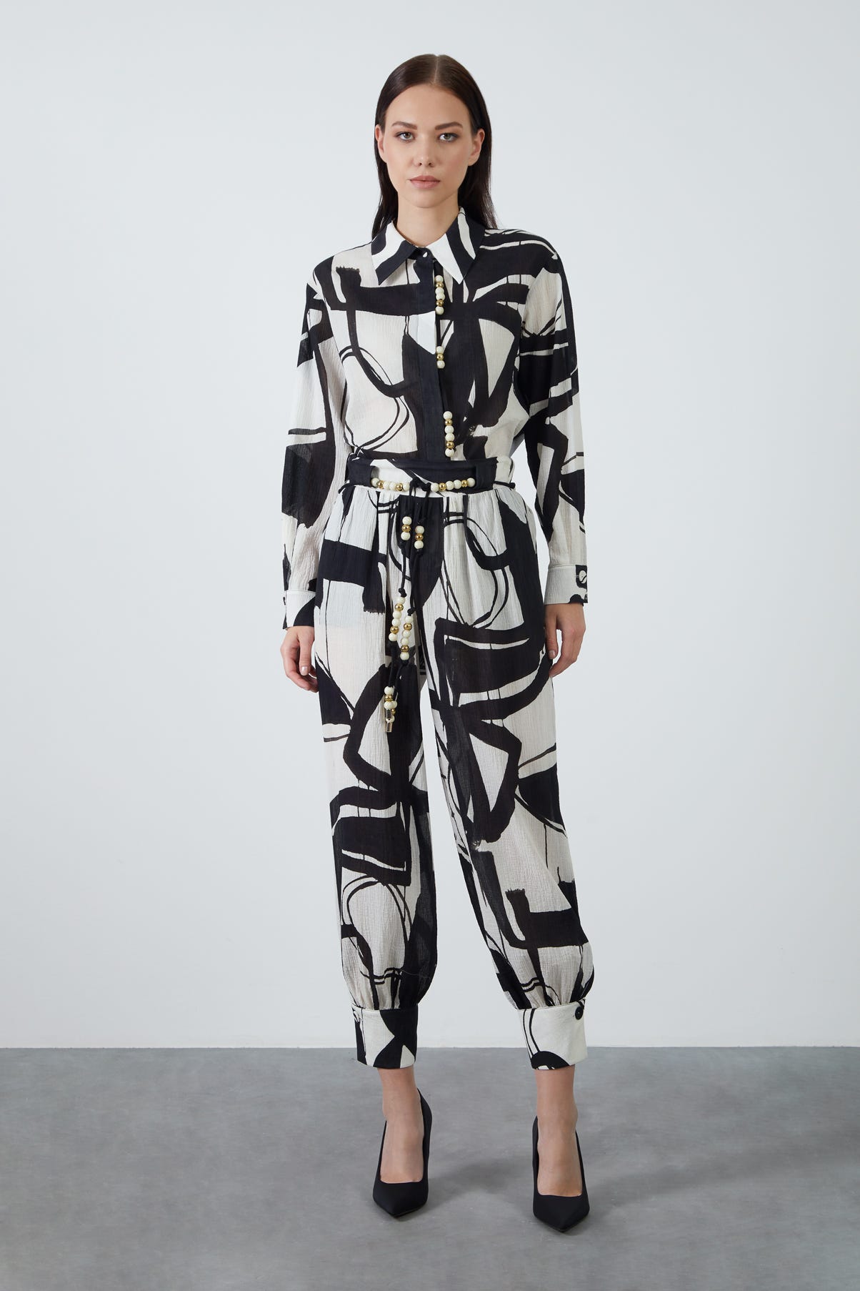 Boncuklu Kordon Detaylı Paça Manşetli Pantolon