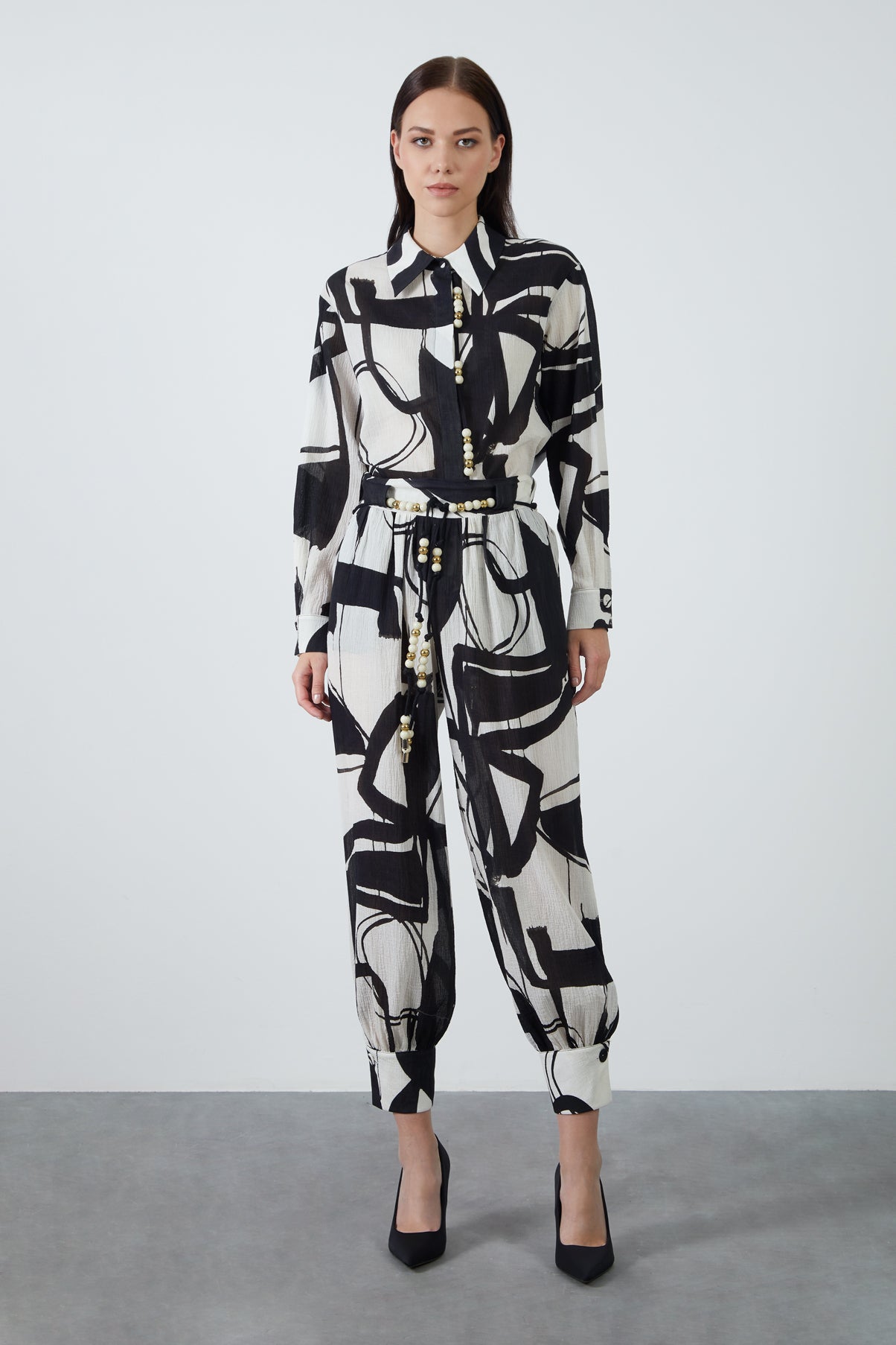 Boncuklu Kordon Detaylı Paça Manşetli Pantolon