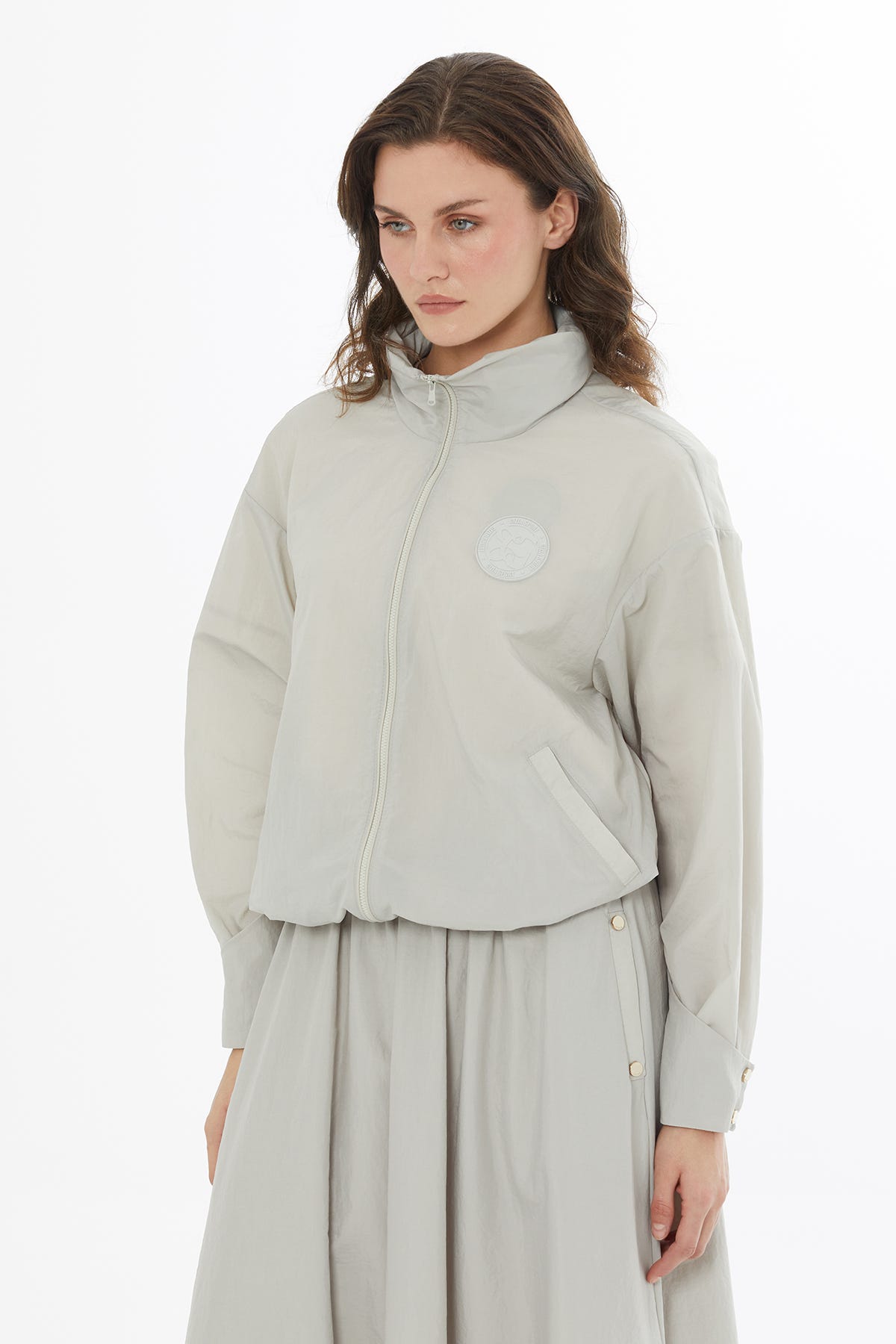 Teknik Kumaşlı Yağmurluk Bej Ceket